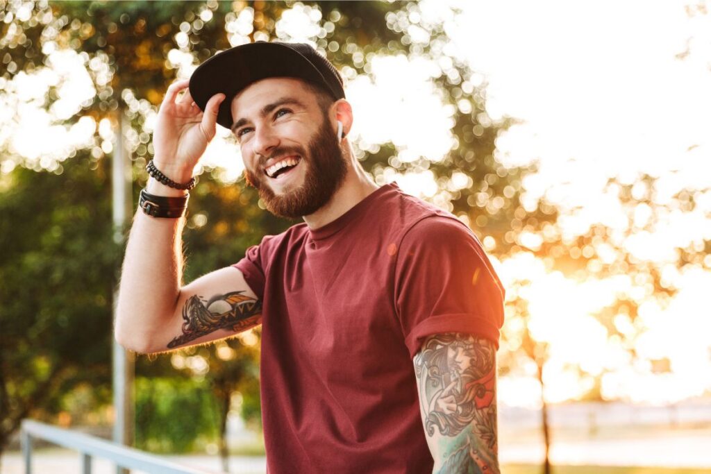 man with tattoo in his arms